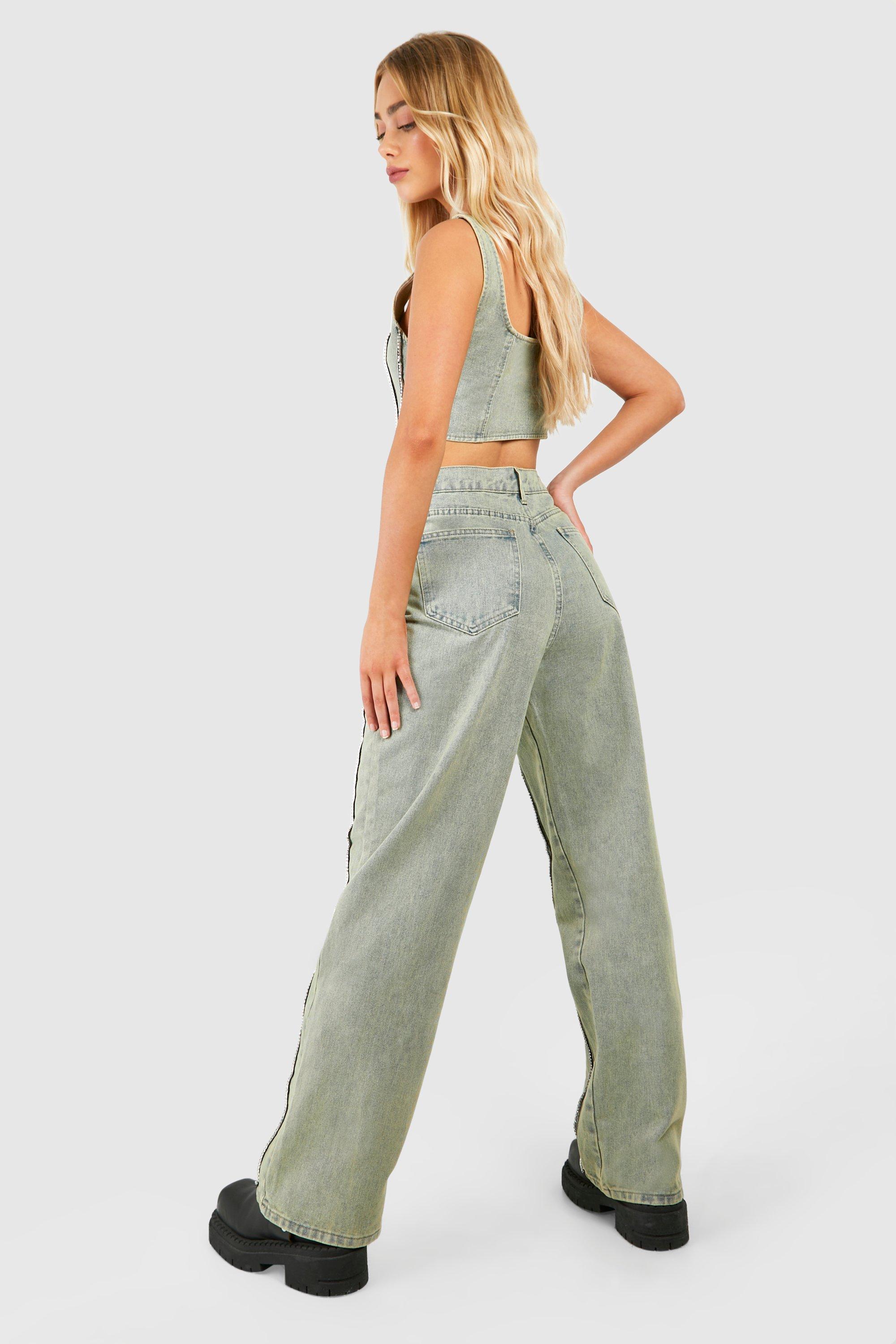 Jeans in lavaggio sporco a righe verticali con cuciture strass